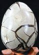 Septarian Dragon Egg Geode With Calcite Crystals #33497-4